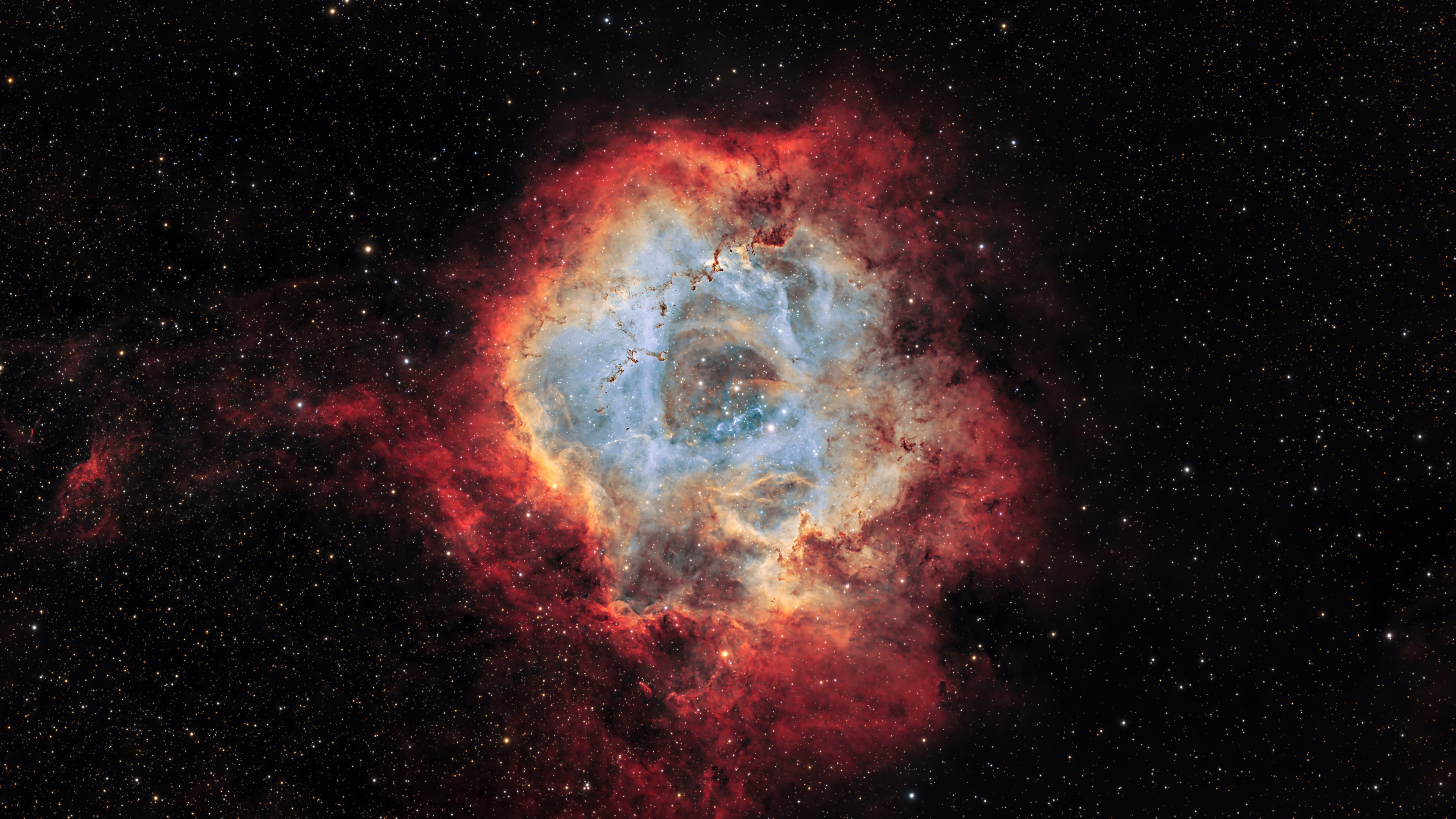 The Trifid Nebula, a cloud of gas and dust where stars are born.